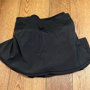 Black lululemon skort with pleated back